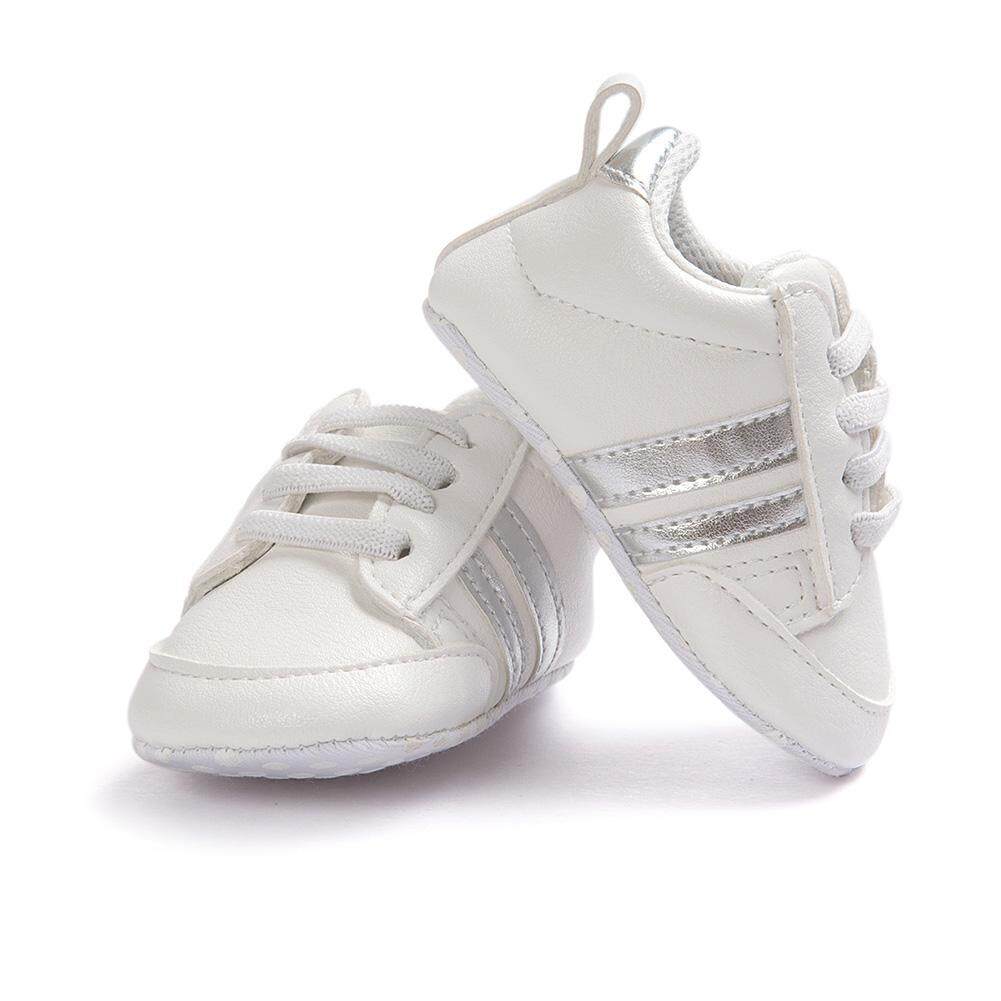 เด็กสาวเด็กแรกวอล์กเกอร์นุ่มแต่เพียงผู้เดียวรองเท้ากันลื่นหนัง PU ทารกรองเท้ากีฬารองเท้าผ้าใบสำหรับเด็กวัยหัดเดิน