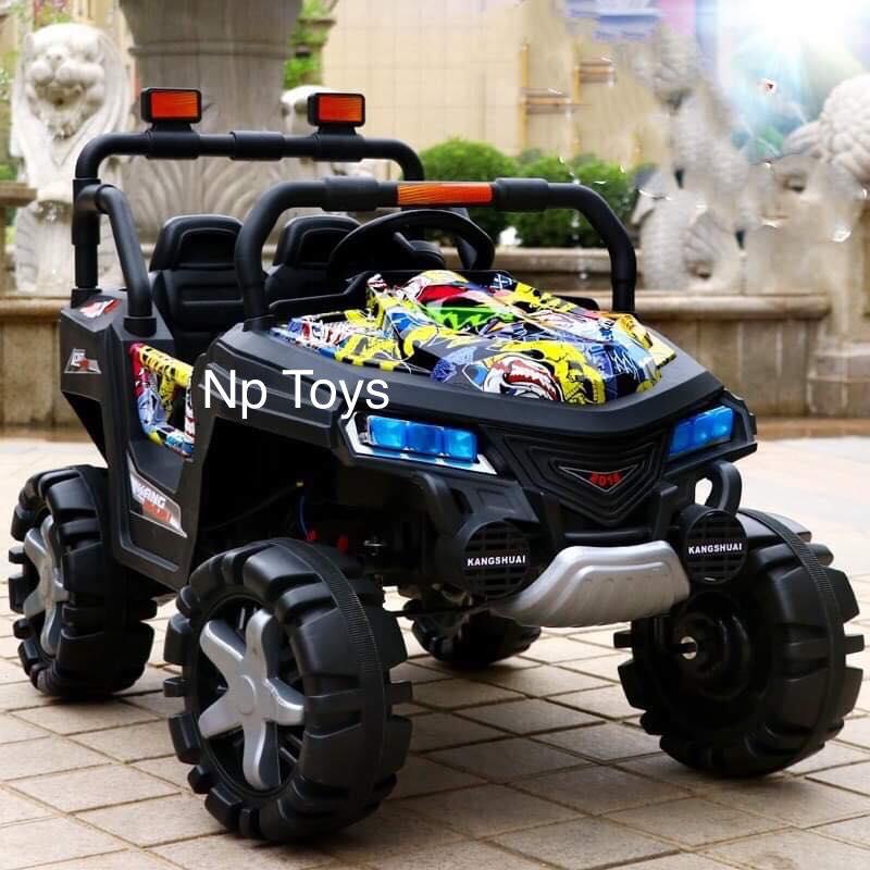 Np Toys รถแบตเตอรี่เด็ก รถเด็กนั่งทรงJeebมีลายด้านหน้า ขนาด5มอเตอร์ขับคลื่อน4ล้อ(มีระบบโยก swing) No.2023