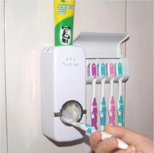 สินค้า Toothpaste Dispenser เครื่องกดยาสีฟันศูนย์ยากาศ พร้อมที่แขวนยาสีฟัน แบบใช้แรงดัดของอากาศในการบีบยาสีฟัน วัศดุเป็นพลาสติกแข็ง ABS