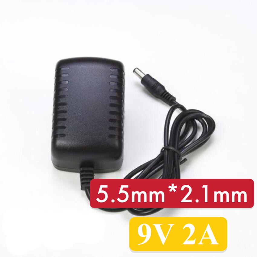 （มีสินค้า）สิ้นค้าขายดี DC อะแดปเตอร์ effect pedal Adapter AC US Plug AC 110V 220V To DC 9V 2A 5.5x2.1mm Power By Triangle