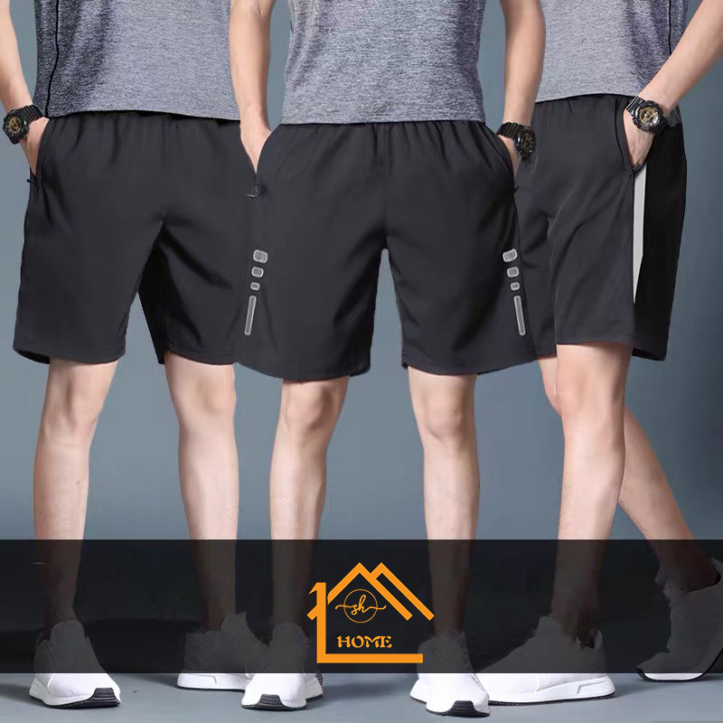 SH HOME 2020 Hot sales กางเกงขาสั้น รูปแบบใหม่ กางเกงขาสั้นกีฬาลำลองสำหรับบุรุษกระเป๋าซิปสองช่องกางเกงขาสั้นกีฬาสำหรับผู้ชาย แห้งเร็ว กางเกงขาสั้นเอวยางยืดทรงหลวมสำหรับสะดวกสบายด้วยผ้า ฝ้าย ระบายอากาศได้สะดวกสบาย กีฬาและการพักผ่อน ขายร้อนในญี่ปุ่น เกาหล