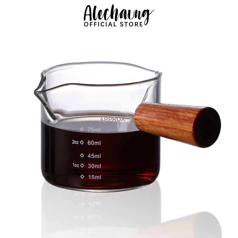 Alechaung แก้วตวงชงกาแฟ แก้วตวง แก้วชงกาแฟ พร้อมด้ามจับไม้ แก้วตวงสองปาก แก้วช็อต ถ้วยตวง 75ml 150ml แก้วชงน้ำขาย ที่ตีฟองนมสด Measuring Cup ราคา 59 บาท*ส่งฟรี