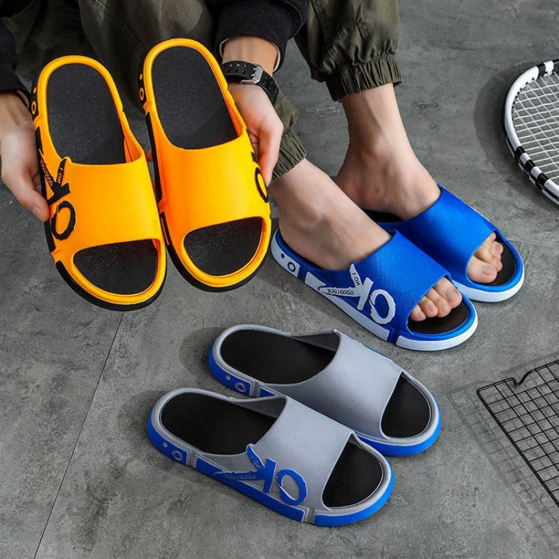 ภาพหน้าปกสินค้าLKShoes มาใหม่ ล่าสุด รองเท้าแตะแฟชั่นผู้ชาย รองเท้าแตะแบบสวม รองเท้าผู้ชาย พิมพ์ด้วย OK  สีตัดกันอย่าลงตัว เท่ห์มา