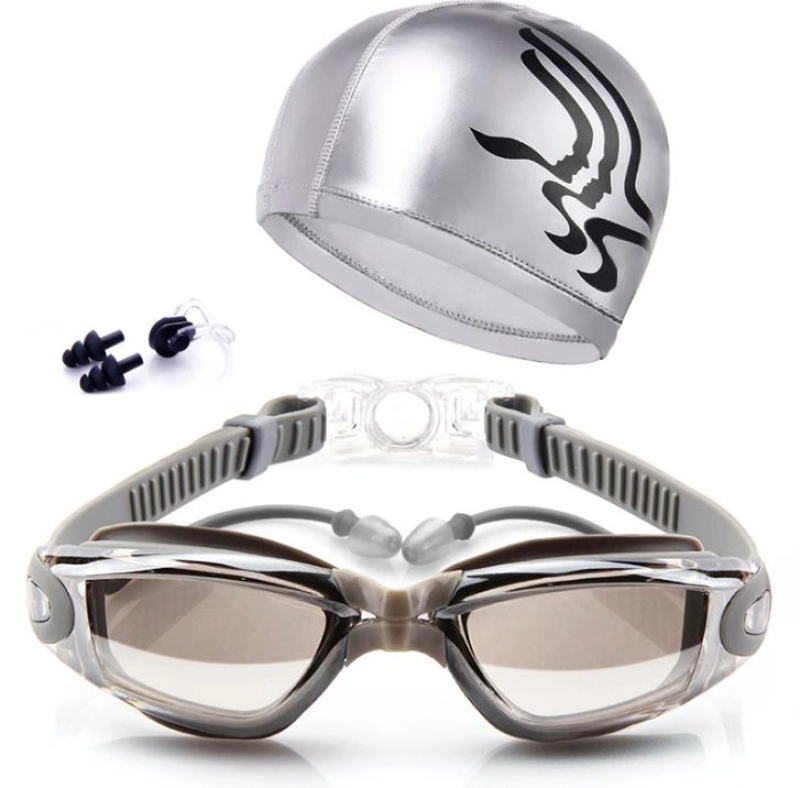 ภาพหน้าปกสินค้าแว่นตาว่ายน้ำ ชุด 4 ชิ้น ชุดแว่นตาว่ายน้ำ ผู้หญิง ผู้ชาย Anti FOG UV ป้องกันการเล่นเซิร์ฟ การว่ายน้ำ Goggles Professional แว่นตากันน้ำ พร้อม หมวกว่ายน้ำ ที่อุดหู ที่อุดจมูก  INTL